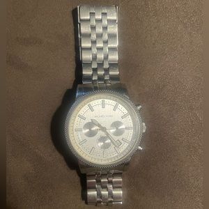Michael Kors Silver watch with White face.